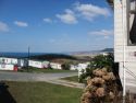The view from the caravan over Brynowen Holiday Park and across Cardigan Bay